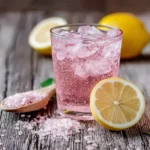 Pink salt diet recipe with lemon and crushed Himalayan salt