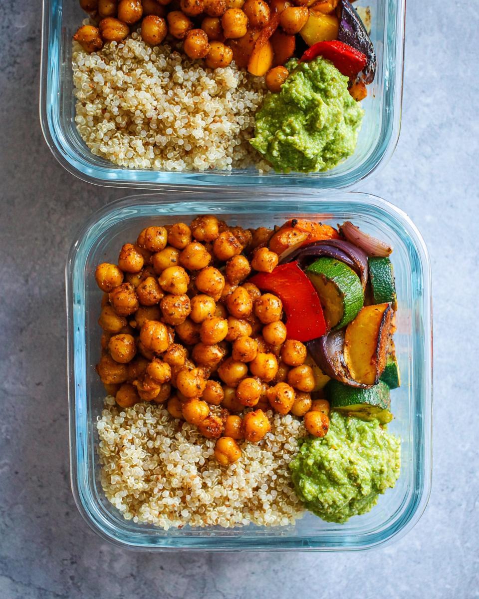 Two glass containers showing a Chickpea Lunch Meal Prep with seasoned chickpeas, quinoa, roasted vegetables, and green sauce.