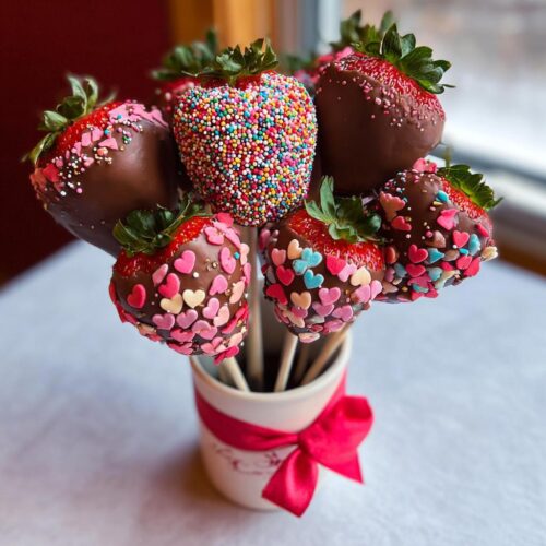 A beautiful Strawberry Bouquet with Sprinkles and Hearts, featuring chocolate-dipped strawberries decorated with colorful sprinkles and heart candies.